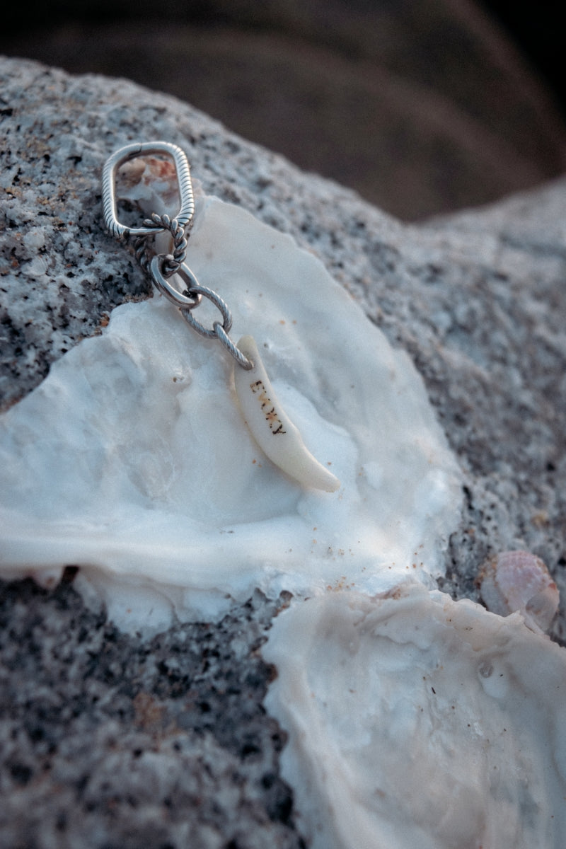 Artificial ivory charm