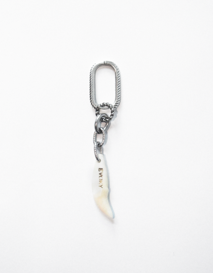 Artificial ivory charm
