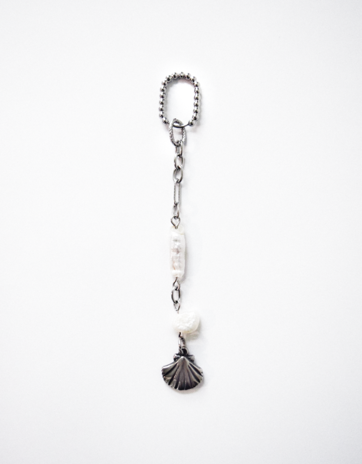 Pearl of seashell charm