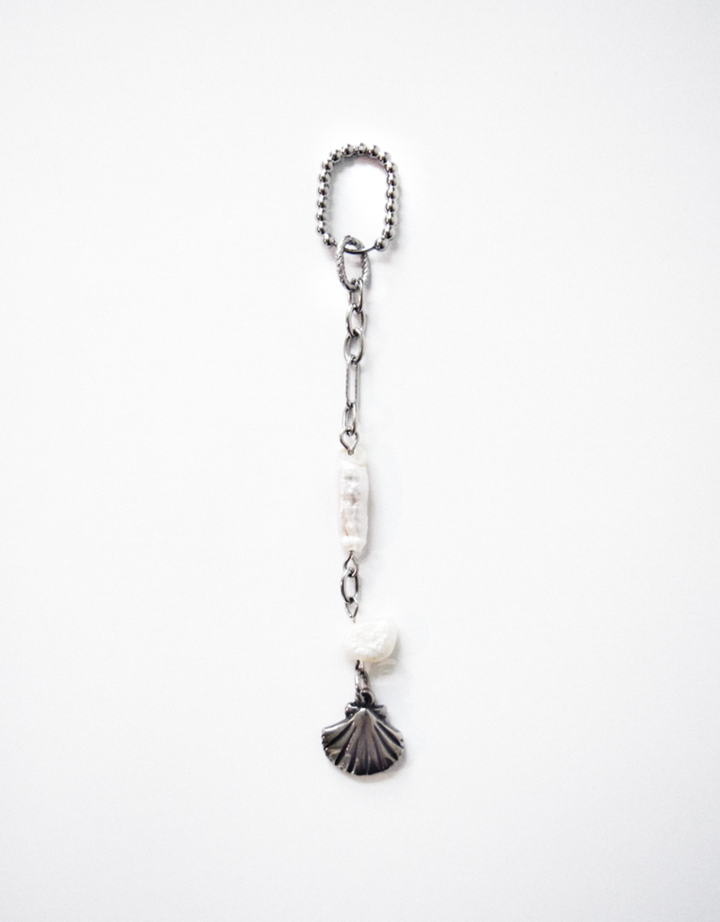 Pearl of seashell charm